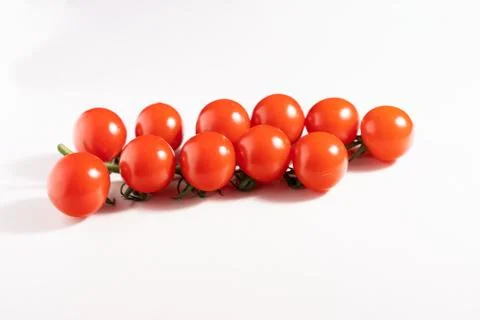 Cherry tomatoes isolated on the white background Stock Photos