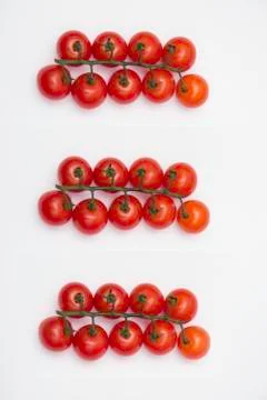 Cherry tomatoes isolated on the white background. Foto stock