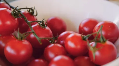 Cherry tomatoes at the kitchen Video stock 63982814