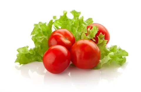 Cherry tomatoes with lettuce Stock Photos