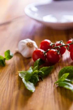 Cherry Tomatoes Mint Garlic and Eggplant Prepared to bee cooked Stock Photos