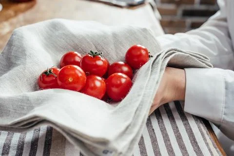 Cherry tomatoes in napkin Stock Photos