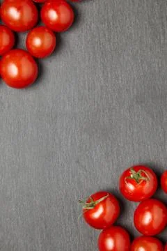 Cherry tomatoes over stone table. Foto stock