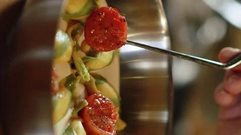 Cherry tomatoes in paste. Slow motion. 120 fps. Vertical video Stock Footage 172440000