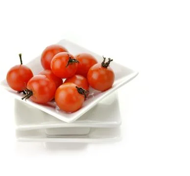 Cherry tomatoes Stock Photos