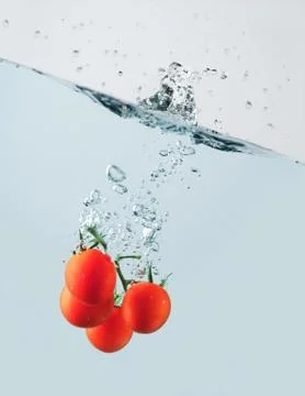 Cherry tomatoes Stock Photos
