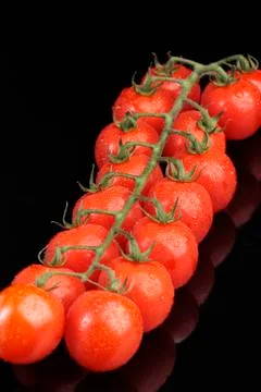 Cherry tomatoes Stock Photos