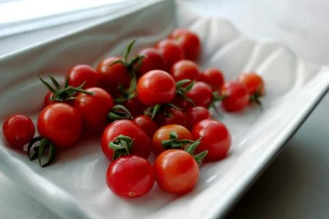 Cherry tomatoes Stock Photos