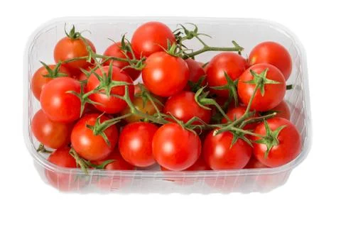 Cherry tomatoes in a plastic container Stock Photos