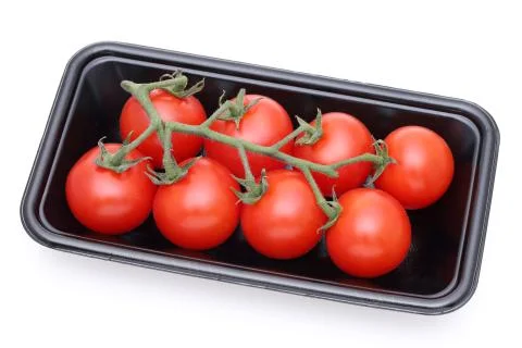 Cherry tomatoes in a plastic pack Stock Photos