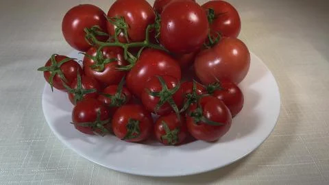 Cherry tomatoes on a plate Stock Photos
