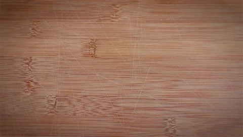Cherry tomatoes rolling on a wooden chopping board to reveal your text Stock Footage 122939175