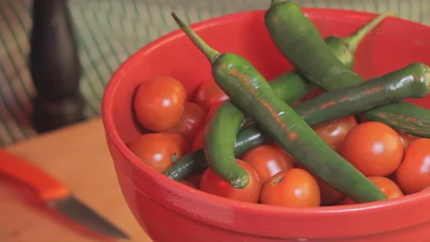 Cherry Tomatoes Rotating With Green Hot Chilli In The Clay Red Bowl (Looped) Stock-Footage 105756648