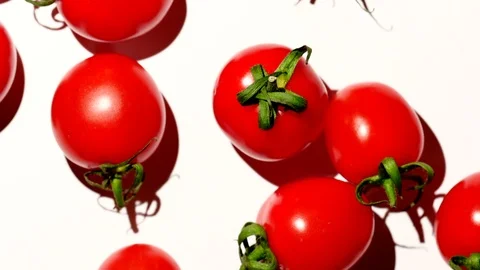 Cherry tomatoes rotating over white background, slight zoom out Stock Footage 119673347