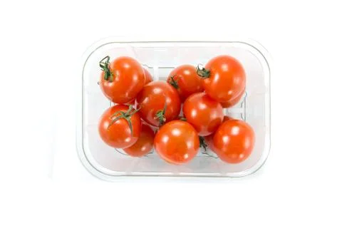 Cherry tomatoes in a store box Stock Photos