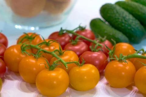 Cherry tomatoes on a store counter. Stock Photos