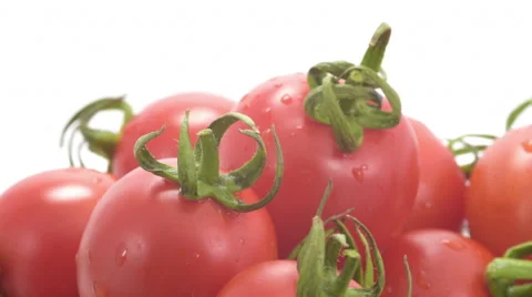 Cherry tomatoes swiftly rotating under studio lighting Video stock 59905664