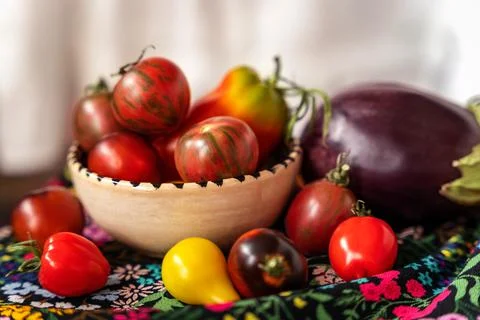 Cherry tomatoes various types, pepper and eggplant vegetable still life Stock Photos