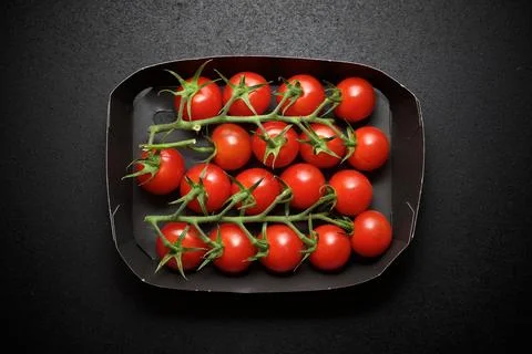Cherry tomatoes view Stock Photos