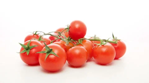 Cherry tomatoes on a white background Vídeo Stock 47579764