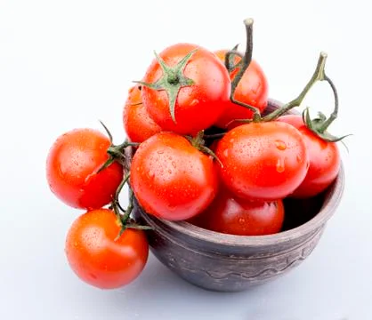 Cherry tomatoes on white background Stock Photos