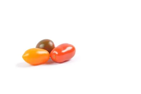 Cherry tomatoes on white background Stock Photos