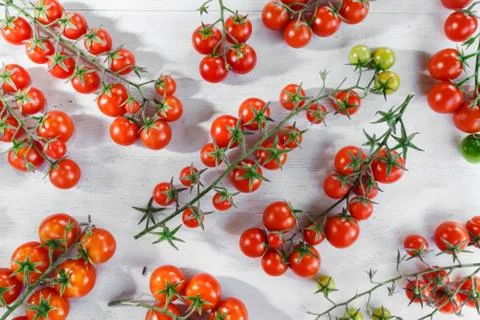 Cherry tomatoes on a white background Stock Photos