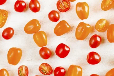 Cherry tomatoes on the white background Stock Photos