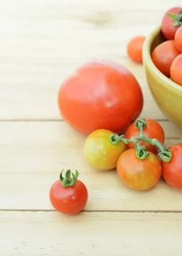 Cherry tomatos vegetable with select macro close up on wooden table backgro.. Stock Photos