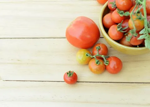 Cherry tomatos vegetable with select macro close up on wooden table backgro.. Stock Photos