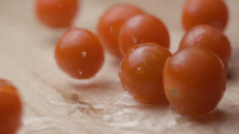 Cherry tomoatoes falling with water slow motion HD 库存影片 113976053