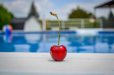 Cherry on water background Stock Photos