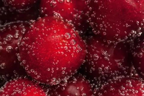 Cherry in water Stock Photos