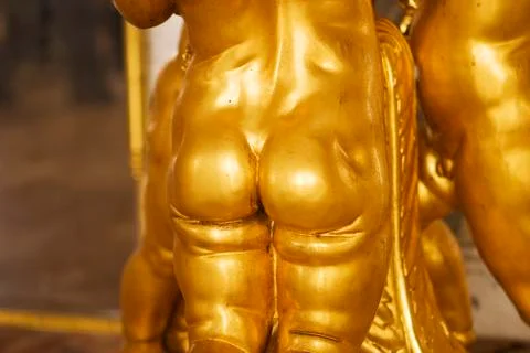 Cherub with golden cheeks Stock Photos