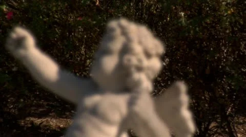 Cherub Statue with Rack Focus (1080-24FPS).mp4 Stock Footage 10976075