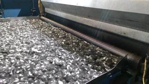 Ches4Carding machine processes geotextile mix. Stock Footage 122212269