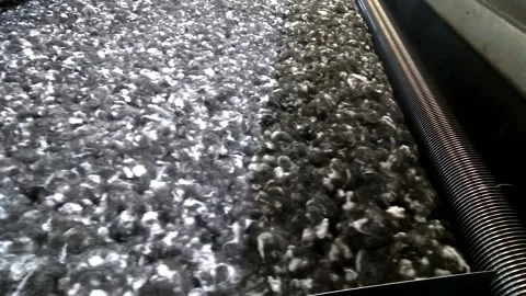 Ches7Carding machine processes geotextile mix. Stock Footage 122212275