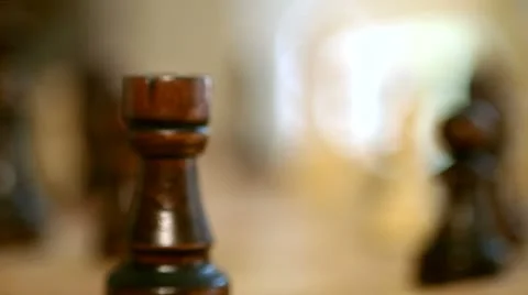 Chess 04: rack focus from castle to queen to castle Stock Footage 8884973