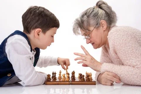 Chess between two generations Stock Photos