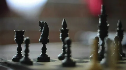 Chess bishop takes a knight Stock Footage
