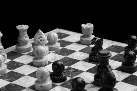 Chess on a black background Stock Photos