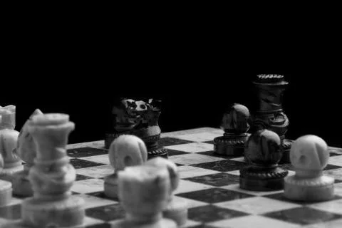 Chess on a black background Stock Photos