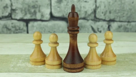 Chess black king and white pawns Stock Footage 78338786