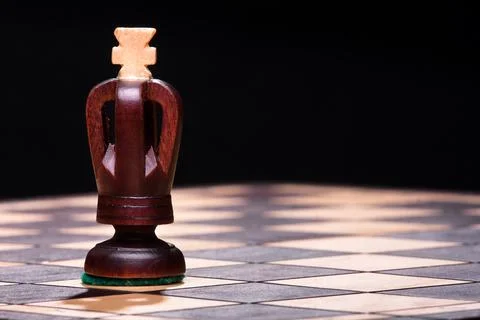 Chess black king on the board Stock Photos