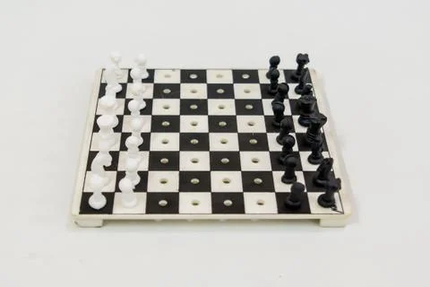 Chess board with figures on isolate white background. Foto stock