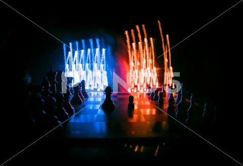 Chess board game concept of business ideas and competition. Chess figures on Stock Photos