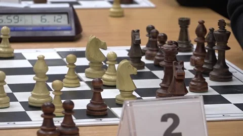 Chess board with pieces arranged during an ongoing game. Stock-Footage 332807488
