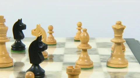 Chess board with pieces dolly left shot Stock Footage 865664