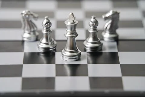 A chess board with pieces. Stock Photos