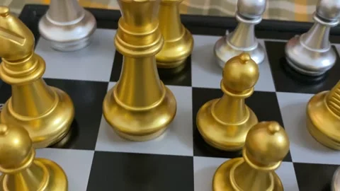 Chess board strategy game with golden and silver chess pieces - close up shot Stock Footage 333047504